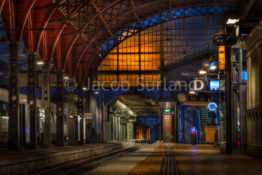 Copenhagen Central Station is a busy station, but this morning I was lucky to capture an empty platform. I particularly like the play between the orange elektrical light and the blue natural light. Photo by: Jacob Surland