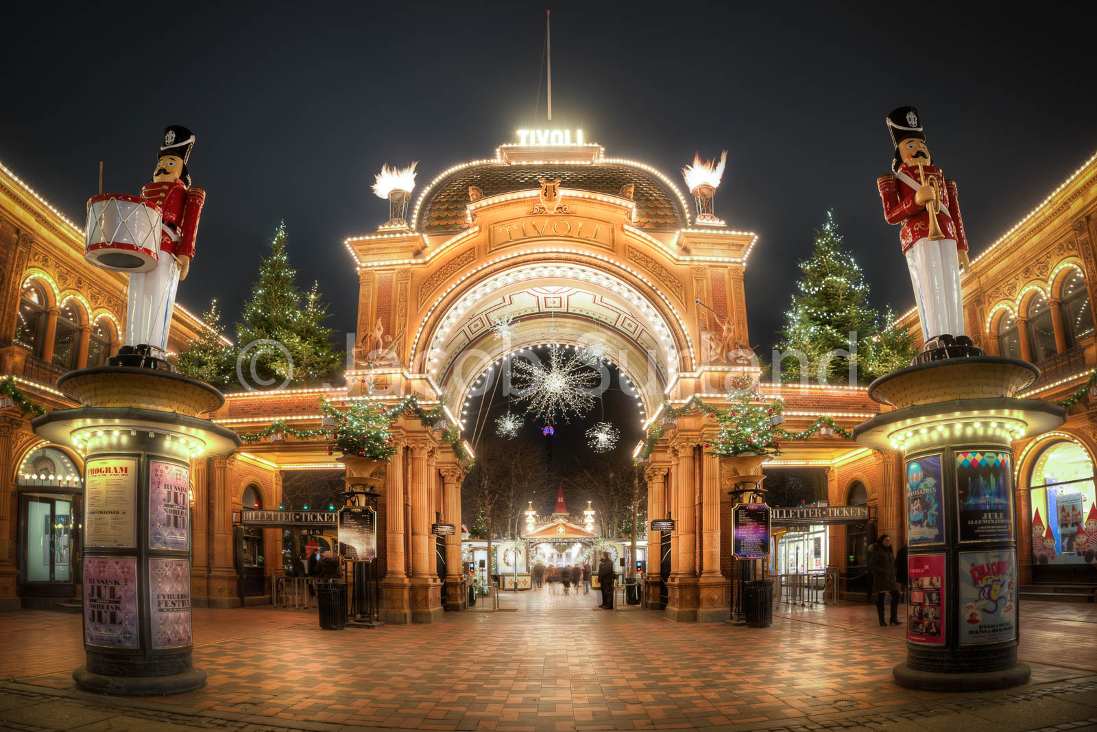 Copenhagen Tivoli Gardens is the second oldest amusements parks in the world. At Christmas they open with Christmas Stalls where you can buy all kinds goodies for your belly and go around and get a true Christmas feeling. Absolutelly very recommendable if you ever go to Copenhagen during Christmast. This is the main entrance. Photo by: Jacob Surland, www.caughtinpixels.com
